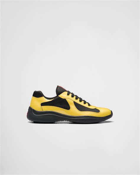 prada black and yellow sneakers|Prada black platform sneakers.